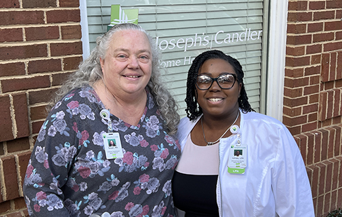Susan Bruggeman and Ashlee Bright, transitional care coordinator at St. Joseph’s and Candler Hospital.